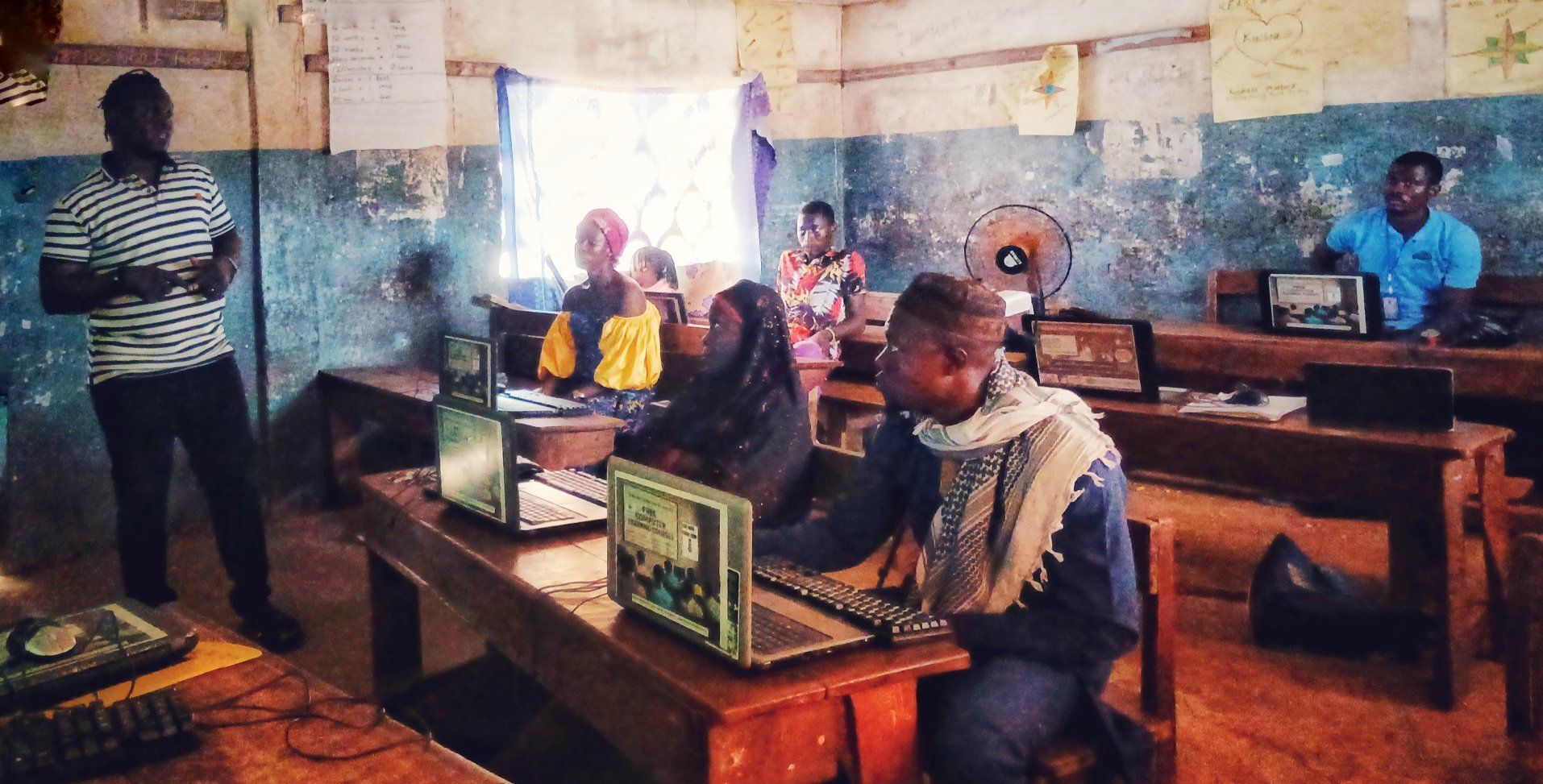 An instructor leading a computer class in the CCAP learning room