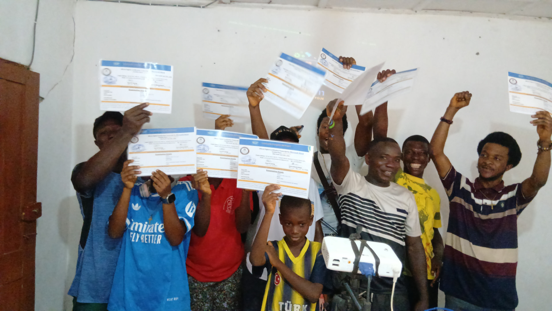 CCAP learners celebrating with their certificates after completing a course